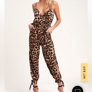 Satin cheetah print Lulu’s jumpsuit with ties at the bottom.